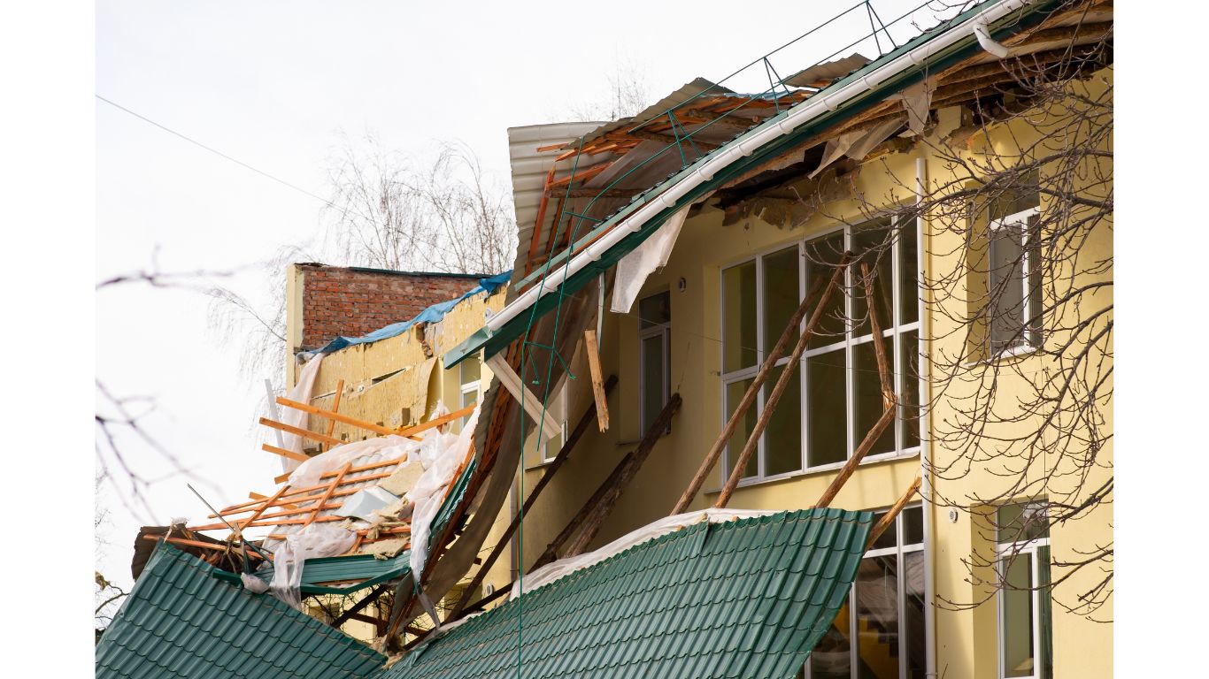 damaged-roof-kindergarten-after-strong-wind_1366 aftermath of storm damage
