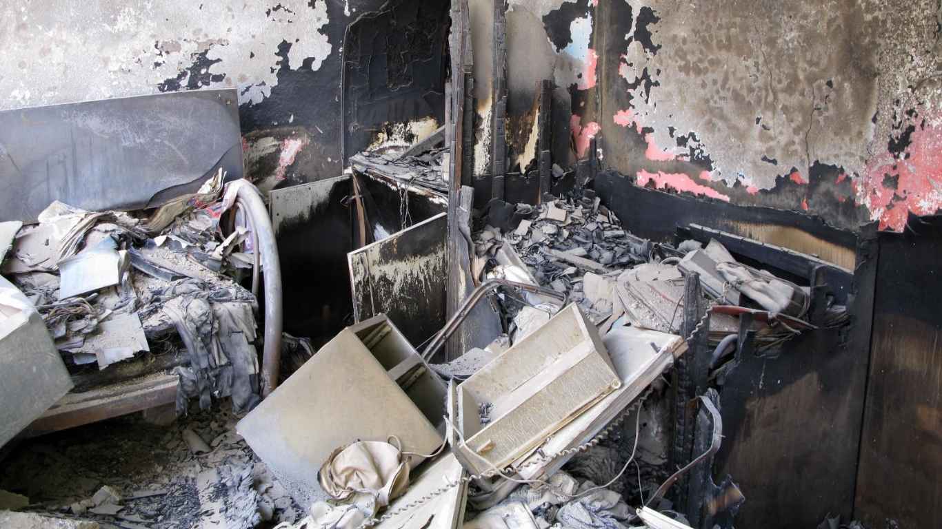 Why Newport Homeowners Shouldn’t Skip Fire Damage Restoration in Newport Charred room debris needing fire damage restoration in Newport